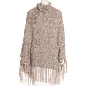 Poncho with fringes